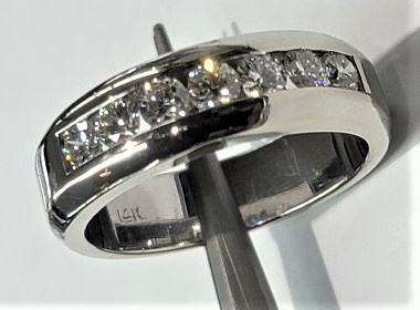 We carry a large selection of Gold, Platinum and Diamond Wedding Bands and Engagement Rings